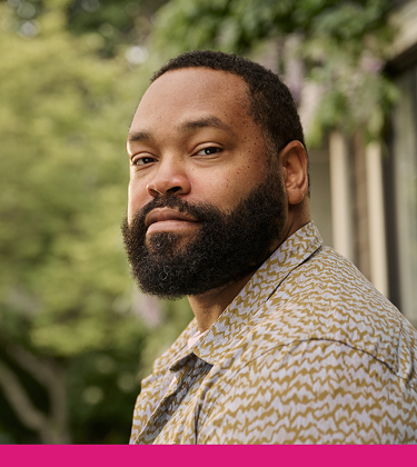 Man looking sideways toward camera